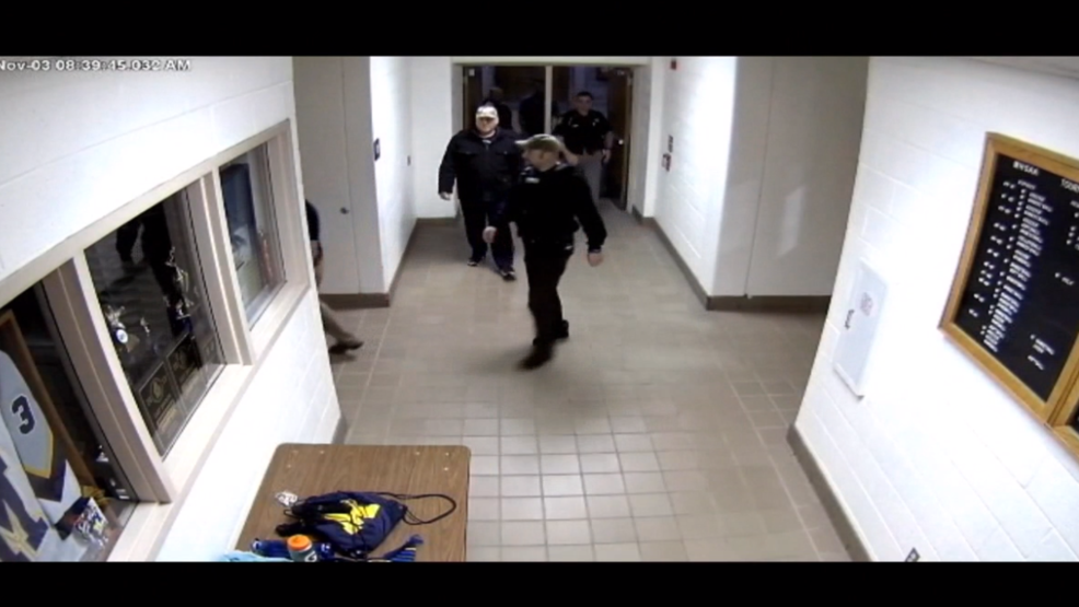 Surveillance video released of woman sneaking into Mattawan school