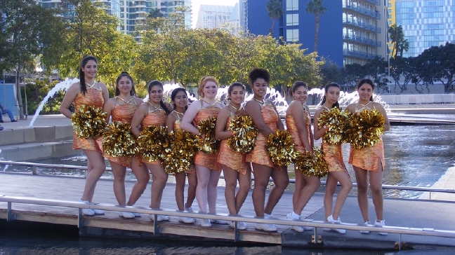 Omaha South HS cheer team performs at Holiday Bowl in San Diego