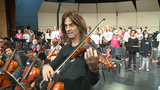 Trans-Siberian Orchestra Mark Wood helps Oshkosh students electrify their musical strings 